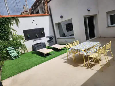 Un patio o zona al aire libre en Casa Patio del Vino