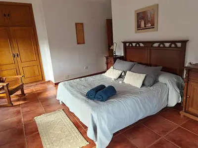 Cama o camas de una habitación en El Locutorio