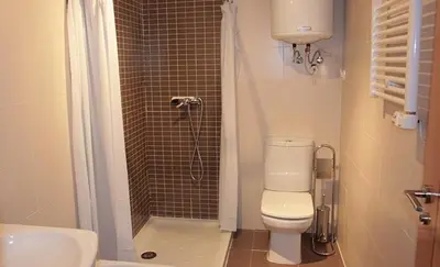 Un baño de Apartamentos La Covatilla