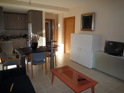 Una cocina o zona de cocina en Apartamentos La Covatilla