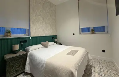 Cama o camas de una habitación en Alojamiento EL ESPOLON