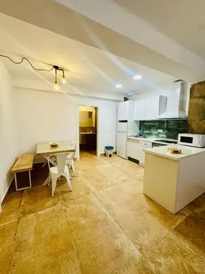 Una cocina o zona de cocina en Arenas del Coliseo Centro Parking Gratis