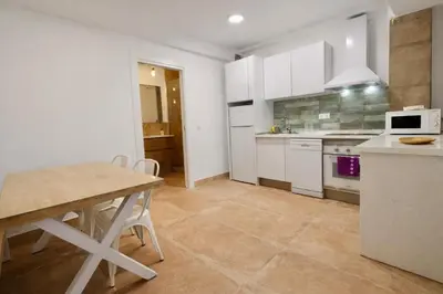 Una cocina o zona de cocina en Arenas del Coliseo Centro Parking Gratis