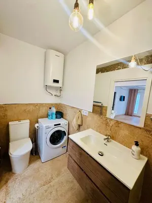 Un baño de Arenas del Coliseo Centro Parking Gratis