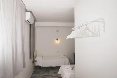 Cama o camas de una habitación en Hotel Rural Macondo