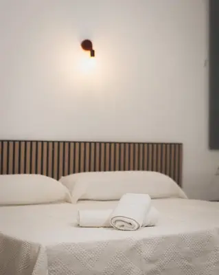 Cama o camas de una habitación en Hotel Rural Macondo