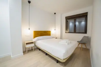 Cama o camas de una habitación en Las villas de Manuel II