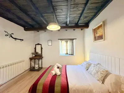 Cama o camas de una habitación en Casa rural Fuente Santa