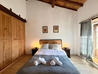 Cama o camas de una habitación en Casa rural Fuente Santa