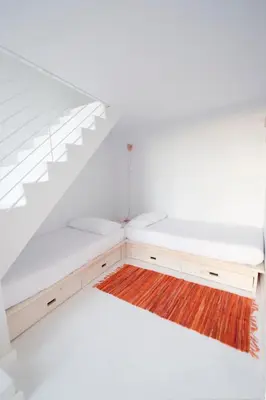 Cama o camas de una habitación en Akassa Alojamientos Bioclimaticos en las Hurdes