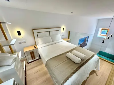 Cama o camas de una habitación en Premium Plaza San Cristóbal - Gran Vía Centro