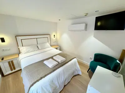 Cama o camas de una habitación en Premium Plaza San Cristóbal - Gran Vía Centro
