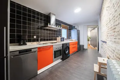 Una cocina o zona de cocina en APT Cozy Billiards Diana Central