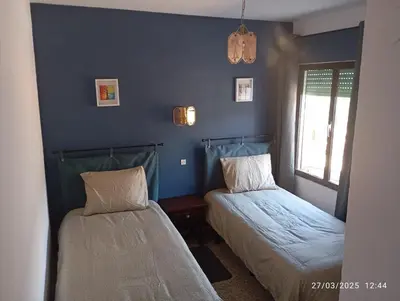 Cama o camas de una habitación en Hostal Prados Abiertos