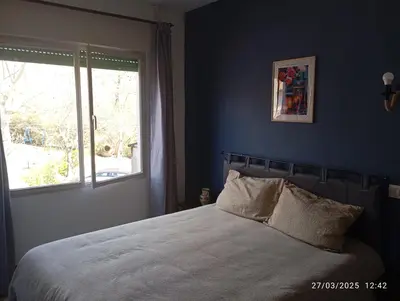 Cama o camas de una habitación en Hostal Prados Abiertos