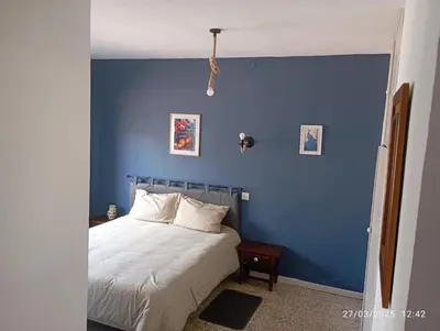 Cama o camas de una habitación en Hostal Prados Abiertos