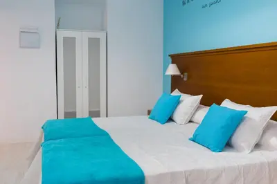 Cama o camas de una habitación en Hostal Imperial centro de Mérida