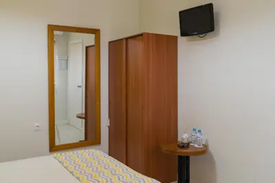 Una televisión o centro de entretenimiento en Hostal Imperial centro de Mérida