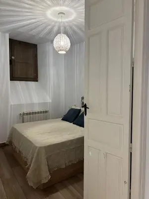 Cama o camas de una habitación en Apartamento turístico El Aljibe