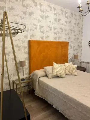 Cama o camas de una habitación en Apartamento turístico El Aljibe