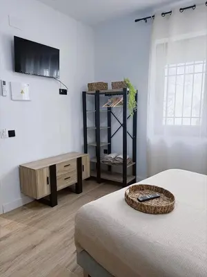 Cama o camas de una habitación en Hostal La Casa Del Escudo