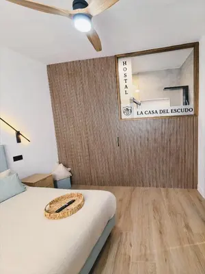 Cama o camas de una habitación en Hostal La Casa Del Escudo
