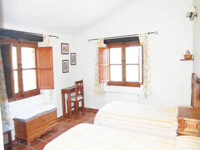 Cama o camas de una habitación en Virgen de la Cabeza Rural House