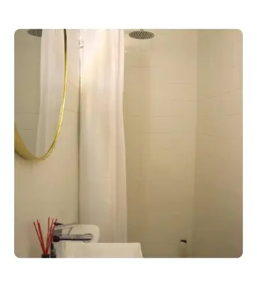 Un baño de Acogedora casita con barbacoa