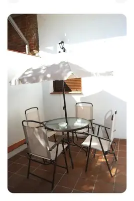Plano de Acogedora casita con barbacoa