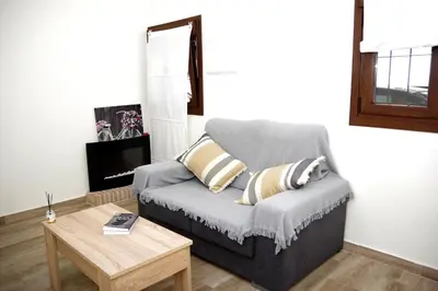 Zona de estar de Acogedora casita con barbacoa