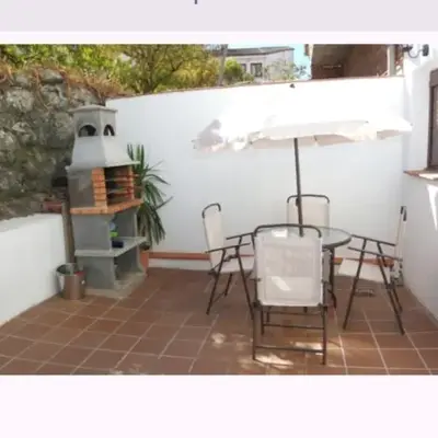 Acogedora casita con barbacoa