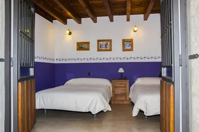 Cama o camas de una habitación en La Fontana de Gredos