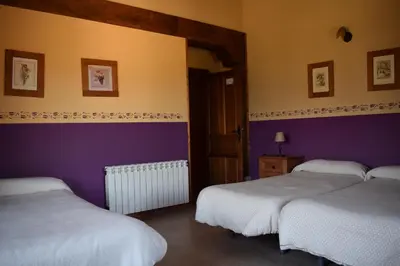 Cama o camas de una habitación en La Fontana de Gredos