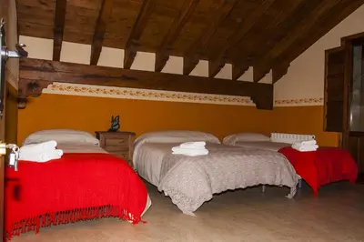 Cama o camas de una habitación en La Fontana de Gredos