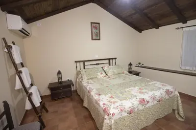 Cama o camas de una habitación en Casa Rural El Quinto y Medio **