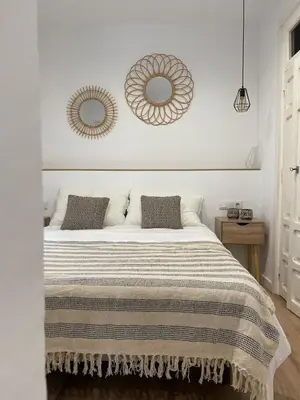 Cama o camas de una habitación en El mirador de la Puerta Talavera