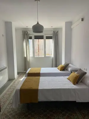 Cama o camas de una habitación en El mirador de la Puerta Talavera