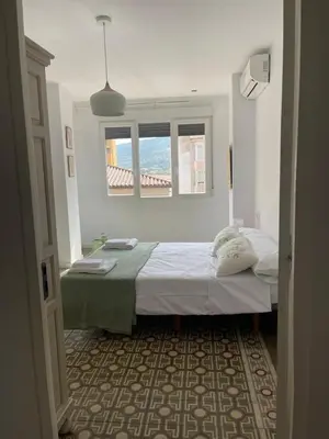 Cama o camas de una habitación en El mirador de la Puerta Talavera