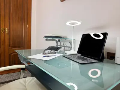 Una televisión o centro de entretenimiento en Domus Altiora Centro
