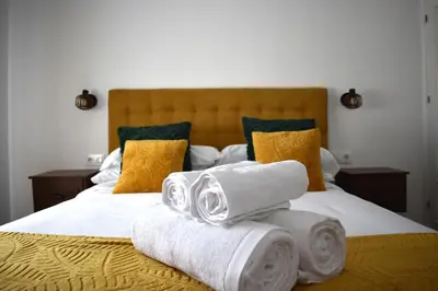 Cama o camas de una habitación en El Rincón de la Jara
