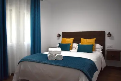Cama o camas de una habitación en El Rincón de la Jara