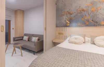 Cama o camas de una habitación en Apartamentos Catedral