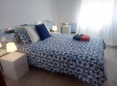 Cama o camas de una habitación en Apartamento de 2 dormitorios a 5 minutos de la plaza mayor