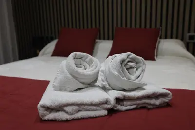 Cama o camas de una habitación en Destino Deluxe Gran Teatro