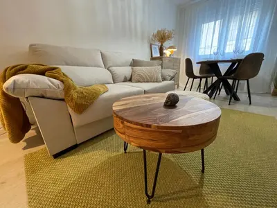 Zona de estar de Hogar de 3 dormitorios acogedores