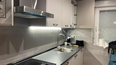 Una cocina o zona de cocina en Hogar de 3 dormitorios acogedores