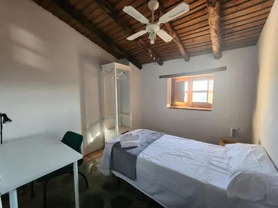 Cama o camas de una habitación en Casa de la luz-Finca la sierra Alojamiento de 4 estrellas completo en el corazón del Geoparque de 6 a 12 personas