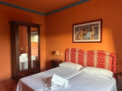 Cama o camas de una habitación en Mágica Casona entre olivos con piscina y chimenea