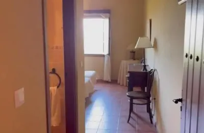 Cama o camas de una habitación en Mágica Casona entre olivos con piscina y chimenea