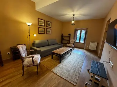 Una televisión o centro de entretenimiento en Apartamento Torre Ochavada By Kubik